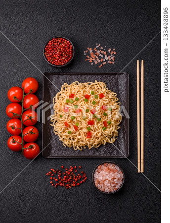 Asian food, chinese or thai rice noodles with vegetables and meat. Rice noodles Asian food, chinese or thai rice noodles with vegetables and meat. Rice noodles 133498896