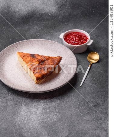 Cake, cheesecake sweet dessert, slice of delicious sweetness on a plate. Piece of cheesecake Cake, cheesecake sweet dessert, slice of delicious sweetness on a plate. Piece of cheesecake 133498901