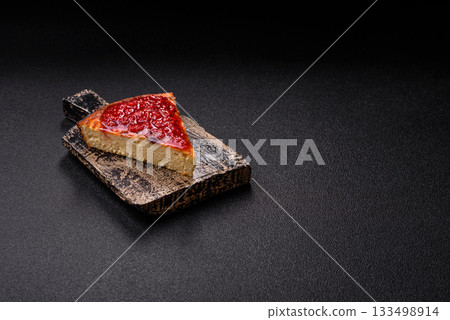 Cake, cheesecake sweet dessert, slice of delicious sweetness on a plate. Piece of cheesecake Cake, cheesecake sweet dessert, slice of delicious sweetness on a plate. Piece of cheesecake 133498914
