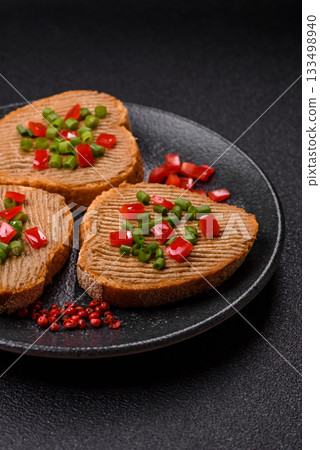 Vegan sandwiches with bread, mushroom or bean pate and vegetables. Vegetarian pate sandwiches 133498940