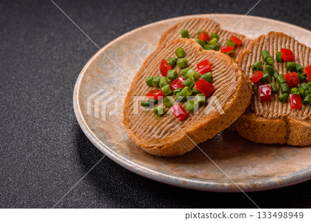 Vegan sandwiches with bread, mushroom or bean pate and vegetables. Vegetarian pate sandwiches 133498949