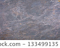 Captivating texture of natural stone with subtle hues and patterns from nature's artistry 133499135