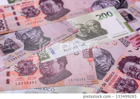 Mexican paper money, pesos in various denominations. Mexican money 133499265
