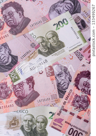 Mexican paper money, pesos in various denominations. Mexican money 133499267