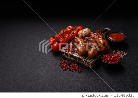 Grilled chicken or beef sausages with sauce and spices. Grilled sausages Grilled chicken or beef sausages with sauce and spices. Grilled sausages 133499325