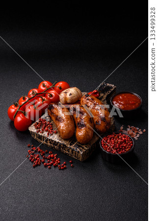 Grilled chicken or beef sausages with sauce and spices. Grilled sausages Grilled chicken or beef sausages with sauce and spices. Grilled sausages 133499328