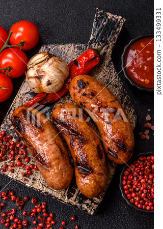 Grilled chicken or beef sausages with sauce and spices. Grilled sausages Grilled chicken or beef sausages with sauce and spices. Grilled sausages 133499331