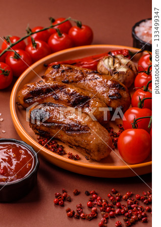 Grilled chicken or beef sausages with sauce and spices. Grilled sausages Grilled chicken or beef sausages with sauce and spices. Grilled sausages 133499347