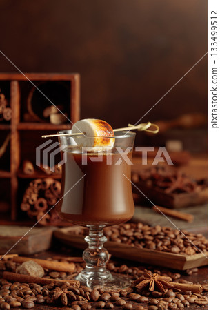 Cream and coffee cocktail, decorated with toasted marshmallow. 133499512