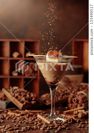 Cream and coffee cocktail with toasted marshmallow and chocolate crumbs. 133499517