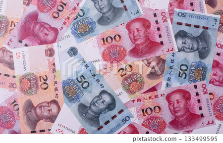 Chinese paper money, yuans in various denominations. China money 133499595