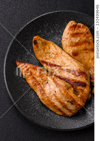 Grilled chicken or turkey breast, a healthy lunch option. Grilled chicken steak Grilled chicken or turkey breast, a healthy lunch option. Grilled chicken steak 133499646