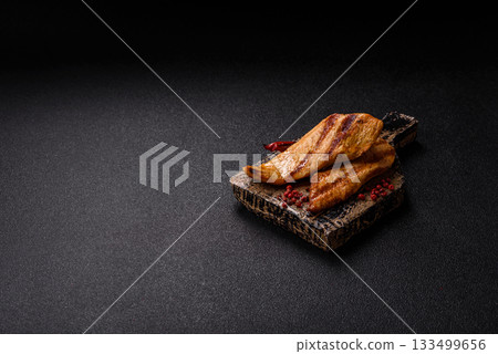 Grilled chicken or turkey breast, a healthy lunch option. Grilled chicken steak Grilled chicken or turkey breast, a healthy lunch option. Grilled chicken steak 133499656