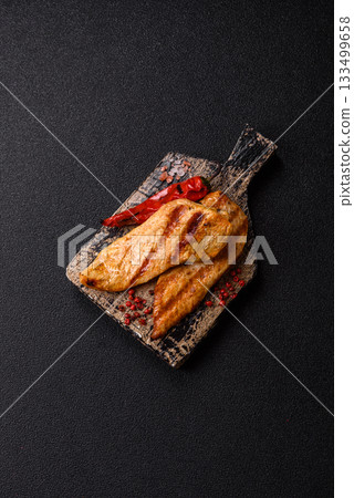 Grilled chicken or turkey breast, a healthy lunch option. Grilled chicken steak Grilled chicken or turkey breast, a healthy lunch option. Grilled chicken steak 133499658