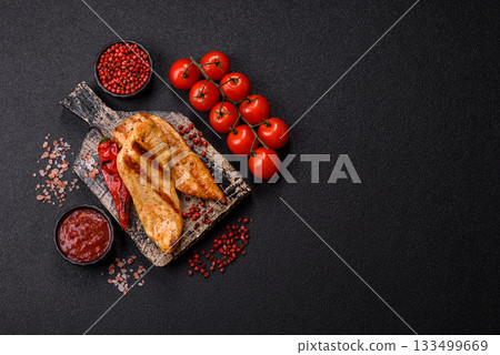 Grilled chicken or turkey breast, a healthy lunch option. Grilled chicken steak Grilled chicken or turkey breast, a healthy lunch option. Grilled chicken steak 133499669