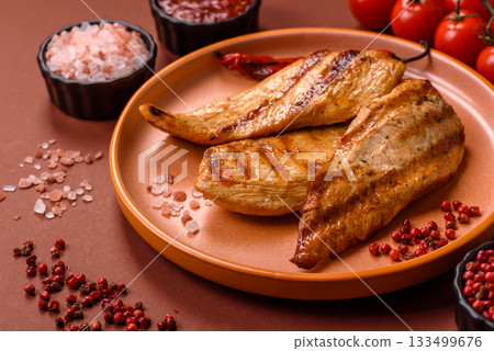 Grilled chicken or turkey breast, a healthy lunch option. Grilled chicken steak 133499676