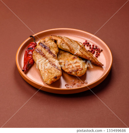 Grilled chicken or turkey breast, a healthy lunch option. Grilled chicken steak Grilled chicken or turkey breast, a healthy lunch option. Grilled chicken steak 133499686