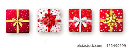 Festive Christmas gift boxes wrapped in red, white, and gold Festive Christmas gift boxes wrapped in red, white, and gold 133499699