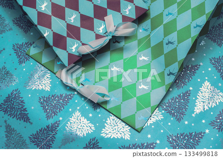 Beautiful holiday packages lying on Christmas backdrop Beautiful holiday packages lying on Christmas backdrop 133499818