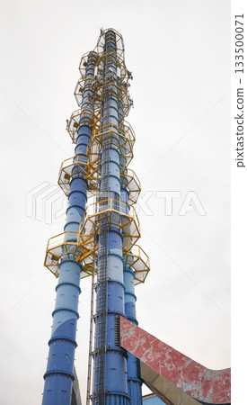 The chimney of a coal fired power plant supplying the district heating network. The chimney of a coal fired power plant supplying the district heating network. 133500071