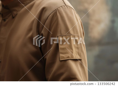 Blank brown square embroidered patch on shirt mockup, ai generated 133500242