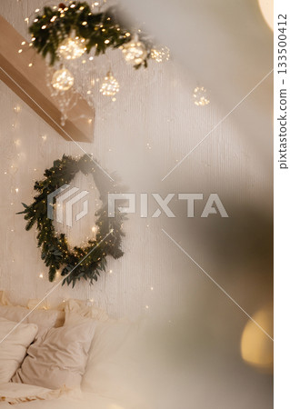 White wooden window frame with blurred warm lights in festive indoor setting White wooden window frame with blurred warm lights in festive indoor setting 133500412