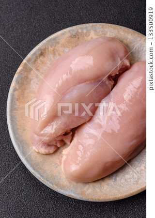 Raw chicken or turkey breast, skinless and boneless. Chicken breast Raw chicken or turkey breast, skinless and boneless. Chicken breast 133500919