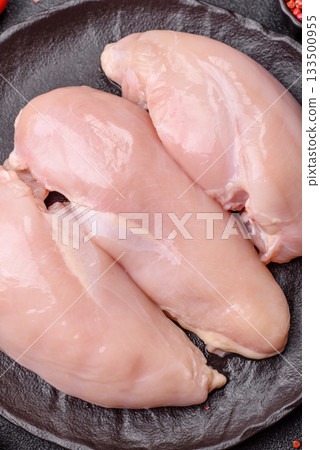 Raw chicken or turkey breast, skinless and boneless. Chicken breast Raw chicken or turkey breast, skinless and boneless. Chicken breast 133500955