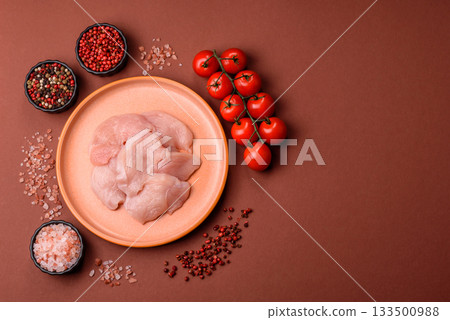 Slices of raw chicken or turkey breast, skinless and boneless. Chicken breast slices 133500988