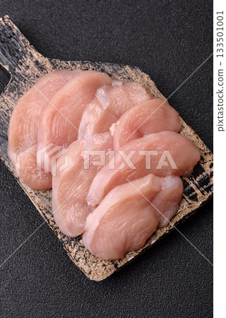 Slices of raw chicken or turkey breast, skinless and boneless. Chicken breast slices Slices of raw chicken or turkey breast, skinless and boneless. Chicken breast slices 133501001
