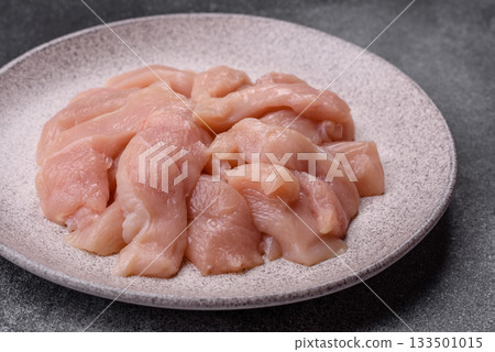 Strips of raw chicken or turkey fillet, skinless and boneless poultry breast. Chicken fillet strips 133501015