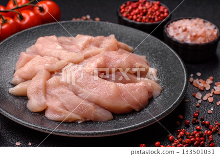 Strips of raw chicken or turkey fillet, skinless and boneless poultry breast. Chicken fillet strips 133501031