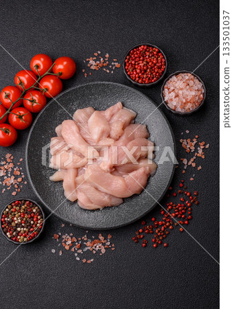 Strips of raw chicken or turkey fillet, skinless and boneless poultry breast. Chicken fillet strips 133501037