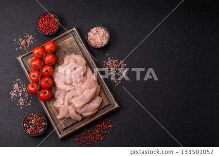 Strips of raw chicken or turkey fillet, skinless and boneless poultry breast. Chicken fillet strips 133501052