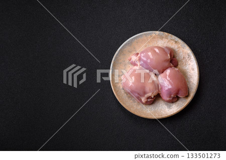 Raw chicken thigh fillet, poultry meat as a source of protein. Chicken thigh fillet 133501273
