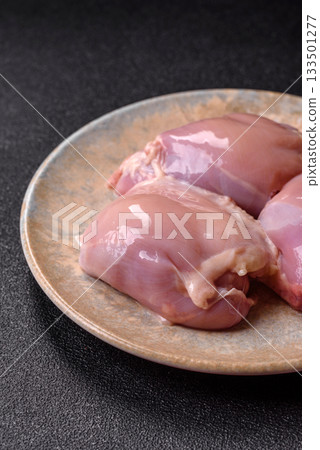 Raw chicken thigh fillet, poultry meat as a source of protein. Chicken thigh fillet 133501277