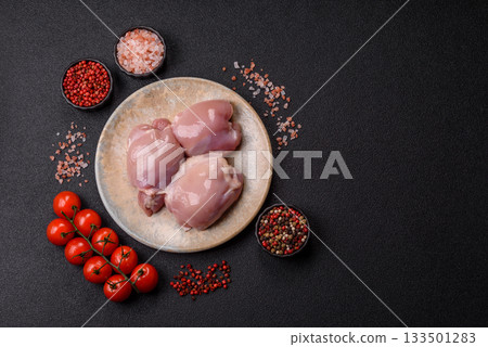 Raw chicken thigh fillet, poultry meat as a source of protein. Chicken thigh fillet 133501283