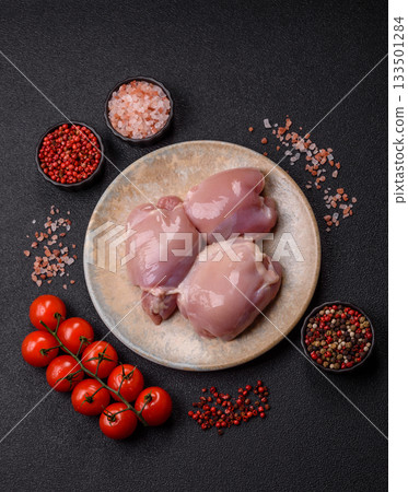 Raw chicken thigh fillet, poultry meat as a source of protein. Chicken thigh fillet 133501284