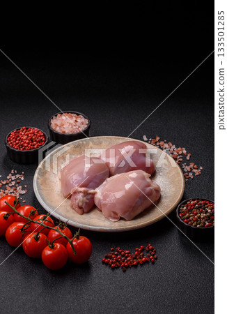 Raw chicken thigh fillet, poultry meat as a source of protein. Chicken thigh fillet 133501285
