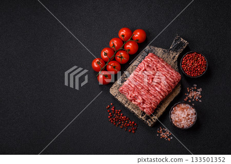 Raw ground beef or pork, prepared meat for burgers or other food preparation. Raw ground beef 133501352
