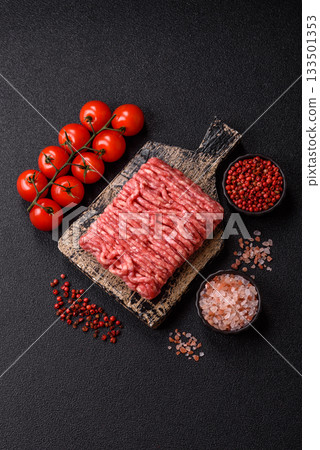 Raw ground beef or pork, prepared meat for burgers or other food preparation. Raw ground beef Raw ground beef or pork, prepared meat for burgers or other food preparation. Raw ground beef 133501353