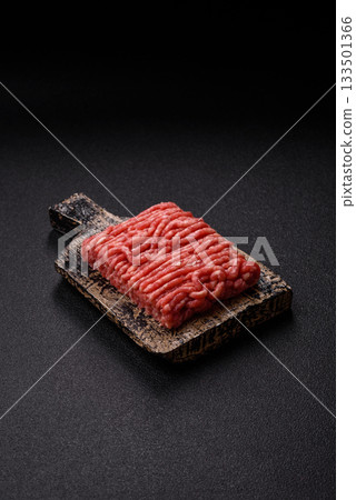 Raw ground beef or pork, prepared meat for burgers or other food preparation. Raw ground beef Raw ground beef or pork, prepared meat for burgers or other food preparation. Raw ground beef 133501366