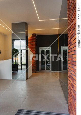 Interior of a building corridor with stairs and elevator Interior of a building corridor with stairs and elevator 133501508
