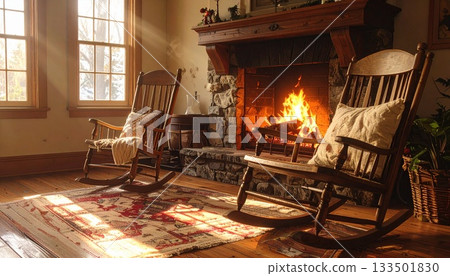 Rocking chair and a warm, flaming fireplace 133501830