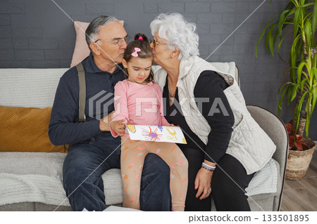 Grandparents sharing love and creativity indoors Grandparents sharing love and creativity indoors 133501895