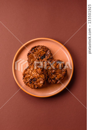 Chocolate chip cookies with caramelized nuts, a healthy sweet snack. Nut cookies Chocolate chip cookies with caramelized nuts, a healthy sweet snack. Nut cookies 133501925