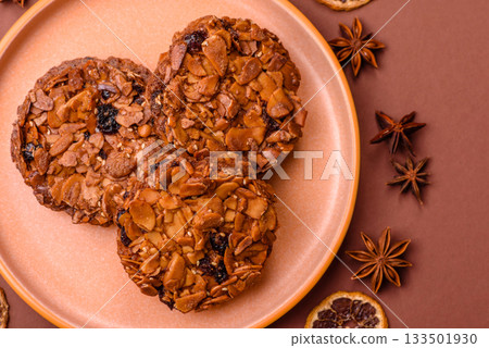 Chocolate chip cookies with caramelized nuts, a healthy sweet snack. Nut cookies Chocolate chip cookies with caramelized nuts, a healthy sweet snack. Nut cookies 133501930