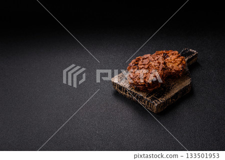 Chocolate chip cookies with caramelized nuts, a healthy sweet snack. Nut cookies Chocolate chip cookies with caramelized nuts, a healthy sweet snack. Nut cookies 133501953