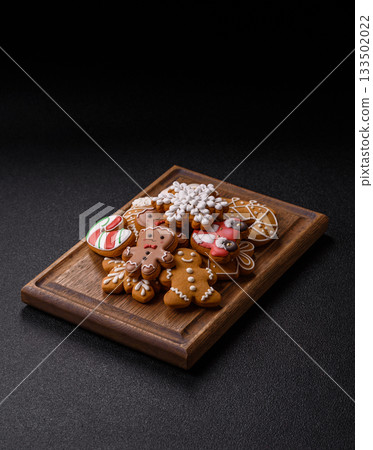 Christmas gingerbread, cookies, or baked goods for the winter holidays. Christmas gingerbread Christmas gingerbread, cookies, or baked goods for the winter holidays. Christmas gingerbread 133502022