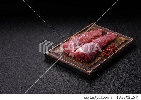 Raw pork tenderloin, fresh meat, a source of protein, and an ingredient for a meal. Pork tenderloin 133502157